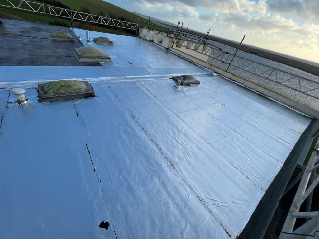 the flat roofing company